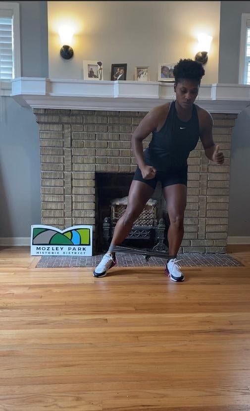 Runners performing standing hip strengthening exercise